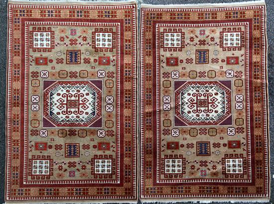 A pair of Kazak rugs, 6ft 1in. by 4ft 1in.